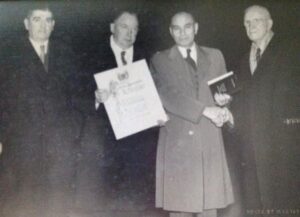 Frank Nighbor receives Hall of Fame Scroll.